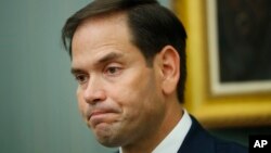 Sen. Marco Rubio, R-Fla., pauses as he speaks during a news conference to discuss hurricane relief efforts for Puerto Rico on Capitol Hill in Washington, Sept. 26, 2017.