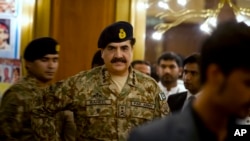 FILE - Pakistan's army chief, General Raheel Sharif, is seen arriving at a seminar in Gwadar, Pakistan, April 12, 2016. He said Tuesday that recent army-led security operations near the Afghan border had uprooted terrorist infrastructures.