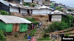 The Chakmarkul refugee camp is seen after a storm, in Cox's Bazar, Bangladesh June 10, 2018. Picture taken June 10, 2018. Kristiana Marton/Save the Children/Handout via REUTERS ATTENTION EDITORS - THIS IMAGE WAS PROVIDED BY A THIRD PARTY. NO RESALES. NO A