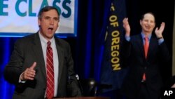 FILE - Senator Jeff Merkley, a Democrat from Oregon, speaks to supporters at the Democratic election night party in Portland Oregon, Nov. 4, 2014.