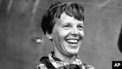 FILE - Amelia Earhart, the American airwoman who is flying round the world for fun, arrived at Port Natal, Brazil, and took off on her 2,240-mile flight across the South Atlantic to Dakar, Africa, June 6, 1937.