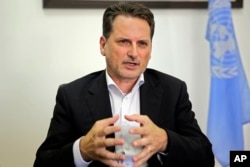 FILE - The head of United Nations Relief and Works Agency for Palestine Refugees (UNRWA) Pierre Krähenbühl speaks during an interview in Jerusalem, Aug. 23, 2018.