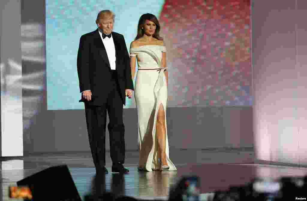 U.S. President Donald Trump and his wife, first lady Melania Trump, arrive at his "Liberty" Inaugural Ball in Washington, D.C., Jan. 20, 2017.