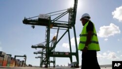 Worker at the container terminal at the port in the Bay of Mariel, Cuba, July 13, 2015.