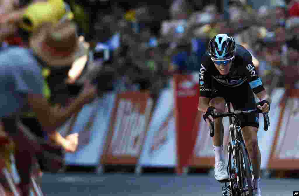 Spectators cheer Britain&rsquo;s Chris Froome as he rides to win the eighth stage of the Tour de France cycling race over 184 kilometers (114.3 miles) with start in Pau and finish in Bagneres-de-Luchon, France.