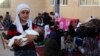 Siswa Irak Masuk Sekolah setelah Tertunda Sebulan