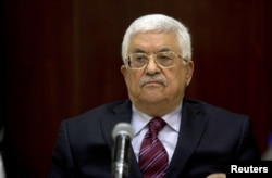ປະທານາທິບໍດີ ປາແລວໄຕນ໌ທ່ານ Mahmoud Abbas, ປະທານ ຂອງພັກ ເສລີປະຊາທິປັດ ໃນກອງປະຊຸມ West Bank ເມືອງ Ramallah, 22 ສິງຫາ 2015.