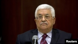 Palestinian President Mahmoud Abbas chairs a Palestinian Liberation Organization (PLO) executive committee meeting in the West Bank city of Ramallah, Aug. 22, 2015. 