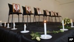 Framed photographs of seven crew members are displayed at a memorial service held by an association of Ethiopian airline pilots, in Addis Ababa, Ethiopia, March 11, 2019. 