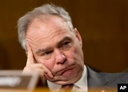 Senate Foreign Relations Committee member Sen. Tim Kaine, D-Va. listens on Capitol Hill in Washington, Jan. 11, 2017, during the committee's confirmation hearing for Secretary of State-designate Rex Tillerson.