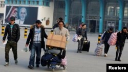 Afghans, whose asylum applications have been rejected, arrive from Germany in Kabul, Afghanistan, Dec. 15, 2016.