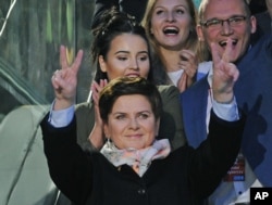 Beata Szydlo, prime minister candidate for the main opposition party Law and Justice leaves after a TV debate with leaders of all parties, in Warsaw, Poland, October 20, 2015.