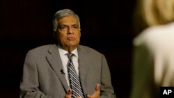 Sri Lankan Prime Minister Ranil Wickremesinghe takes a question during an interview with the Associated Press at his office in Colombo, Sri Lanka, April 25, 2019.