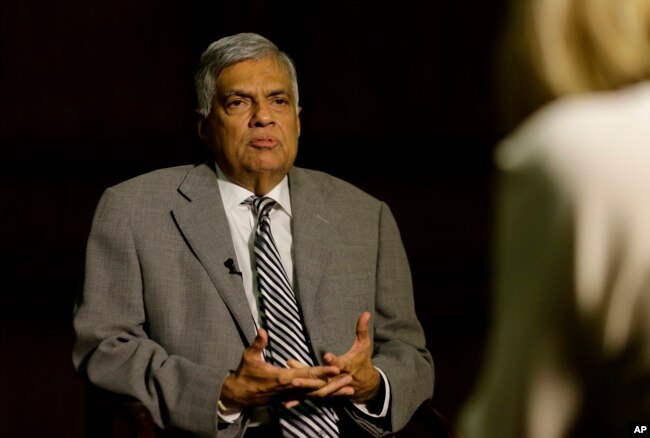 Sri Lankan Prime Minister Ranil Wickremesinghe takes a question during an interview with the Associated Press at his office in Colombo, Sri Lanka, April 25, 2019.