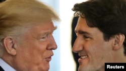 Rais wa Marekani Donald Trump na waziri mkuu wa Canada Justin Trudeau .