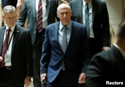 Director of National Intelligence Dan Coats arrives for a closed senators-only Capitol Hill briefing on election security at the U.S. Capitol in Washington, Aug. 22, 2018.