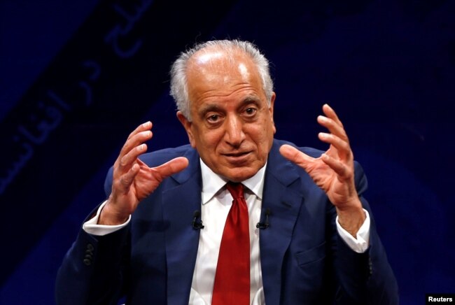 FILE - US envoy for peace in Afghanistan Zalmay Khalilzad speaks during a debate at Tolo TV channel in Kabul, Afghanistan, April 28, 2019.