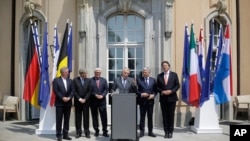 The Foreign Ministers from EU's founding six Jean Asselborn from Luxemburg, Paolo Gentiloni from Italy, Frank-Walter Steinmeier from Germany, Jean-Marc Ayrault from France, Didier Reynders from Belgium and Bert Koenders from the Netherlands, brief the media after a meeting on the so-called Brexit in Berlin, Germany, Saturday, June 25, 2016. 