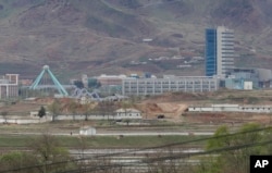FILE - The Kaesong industrial complex in North Korea is seen from the Taesungdong freedom village inside the demilitarized zone during a press tour in Paju, South Korea, April 24, 2018.