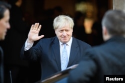 Foreign Secretary Boris Johnson leaves after listening to Britain's Prime Minister Theresa May deliver her keynote speech on Brexit at Lancaster House in London, Jan. 17, 2017.