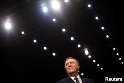 Representative Mike Pompeo (R-KS) arrives to testify before a Senate Intelligence hearing on his nomination of to be become director of the CIA at Capitol Hill in Washington, Jan. 12, 2017.