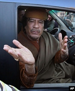 Mouammar Khadafi (photo prise en avril 2011 à Tripoli)