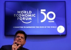 FILE - Piyush Goyal, India's Minister of Railways and Minister of Commerce and Industry, attends a session at the 50th World Economic Forum annual meeting in Davos, Switzerland, January 21, 2020.
