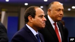 FILE - Egypt's President Abdel-Fattah el-Sissi, foreground, arrives for the 70th session of the U.N. General Assembly at U.N. headquarters, Sept. 28, 2015.