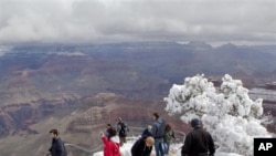 Visitors at the Grand Canyon's Yavapai Point