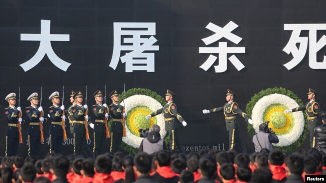 中国2018年12月13日举行祭奠南京大屠杀活动(路透社)