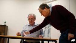 Theater director Nicholas Kent, right, and actor Peter Davison rehearse for the play "All the President's Men?" in London, April 20, 2017. Davison played U.S. Secretary of State Rex Tillerson.