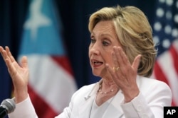 FILE - Democratic presidential candidate Hillary Clinton speaks at a news conference after a discussion about health care in San Juan, Puerto Rico, Sept. 4, 2015.
