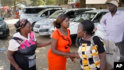 FILE - Sharon Andisi, center, arrives at the Pumwani Maternity Hospital in Nairobi, Kenya, on Jan. 9, 2017. Maternal mortality rates remain high in sub-Saharan Africa in 2024, with Kenyan officials saying more than 6,000 women die each year due to poor access to maternity care.