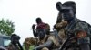 FILE - South Sudanese SPLA soldiers are pictured in Pageri in Eastern Equatoria state, Aug. 20, 2015. The United Nations refugee agency, Feb. 12, 2019, says a surge of violence in Equatoria State has displaced thousands fleeing to the Democratic Republic of Congo.