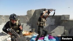 伊拉克特种部队6月19日在拉马迪与激进分子作战