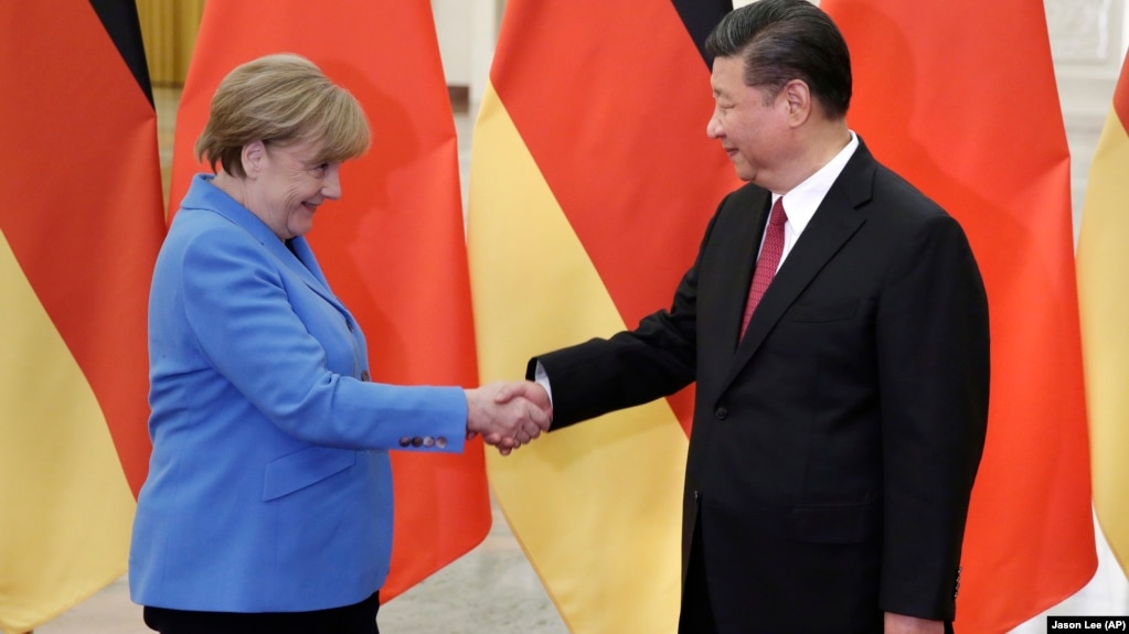2018年5月24日中国国家主席习近平在北京人民大会堂会见德国总理默克尔。(photo:VOA)