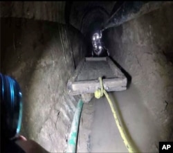 UThis April 25, 2015 photo, from the U.S. Border Patrol and introduced as evidence in U.S. District Court, shows a trolley in the Mexican side of a tunnel that stretched to Calexico, California.