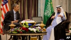 Presiden AS Barack Obama dalam sebuah pertemuan dengan Raja Saudi, Abdullah, pada Maret 2014.