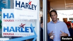 Democratic congressional candidate Harley Rouda speaks to a reporter at a campaign office in Costa Mesa, California, Nov. 3, 2018.