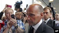 Geir Lippestad, lawyer of Norwegian Anders Behring Breivik, the man accused of a killing spree and bomb attack in Norway, is pictured arrives at a court in Oslo, Norway, July 25, 2011