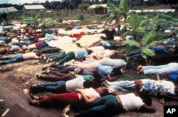 FILE - This Nov. 1978 file photo shows the bodies of Peoples Temple mass suicide victims led by Jim Jones in Jonestown, Guyana.