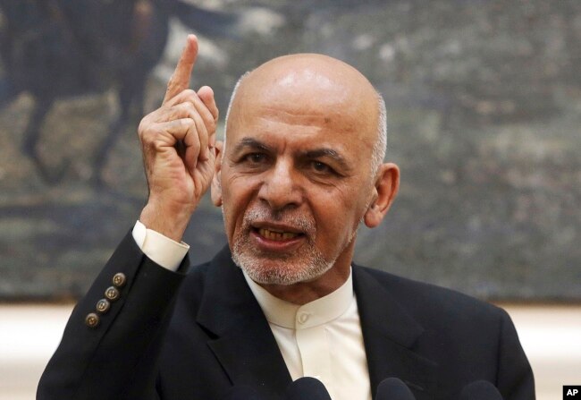 FILE - Afghan President Ashraf Ghani speaks during a press conference at the presidential palace in Kabul, Afghanistan, July 15, 2018.