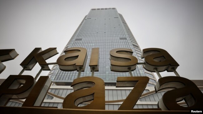 FILE: A picture shows the Kaisa Plaza of Kaisa Group Holdings Ltd on a hazy day in Beijing, China, Nov. 5, 2021.
