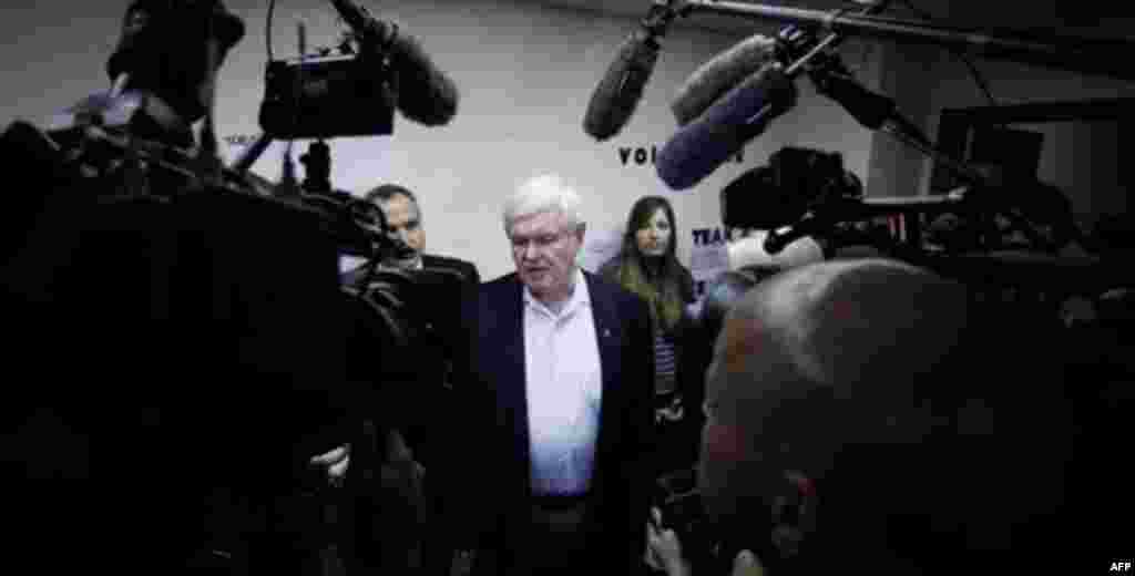 Republican presidential candidate, former House Speaker Newt Gingrich talks with the media during a stop at his campaign office, Thursday, Dec. 29, 2011, in Sioux City, Iowa. (AP Photo/Eric Gay)