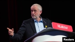 FILE - Labor Party leader Jeremy Corbyn speaks during Labor's women's conference in Liverpool, England, Sept. 24, 2016. He says that if the government calls an election, his party will "welcome the challenge."