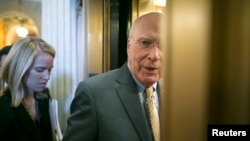 U.S. Senator Patrick Leahy wraps up a talk to reporters at the U.S. Capitol in Washington April 29, 2014.
