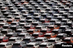 FILE - Newly manufactured Subaru vehicles await export in a port in Yokohama, Japan, May 30, 2017.