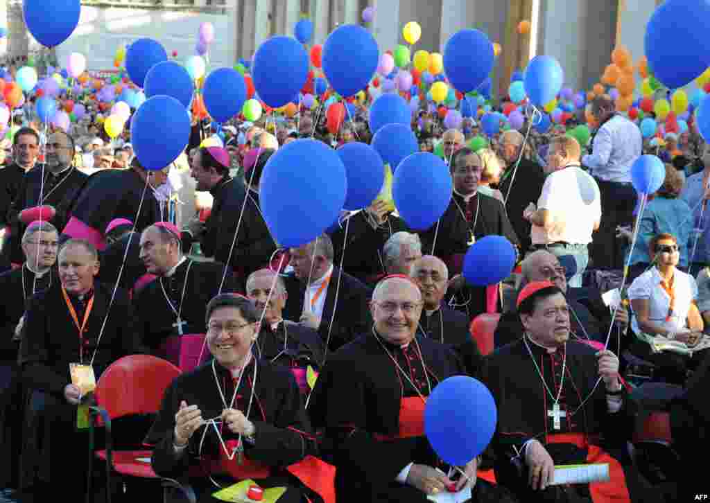 Cardinals hold balloons at St. Peter's square on the occasion of Family Day at the Vatican.
