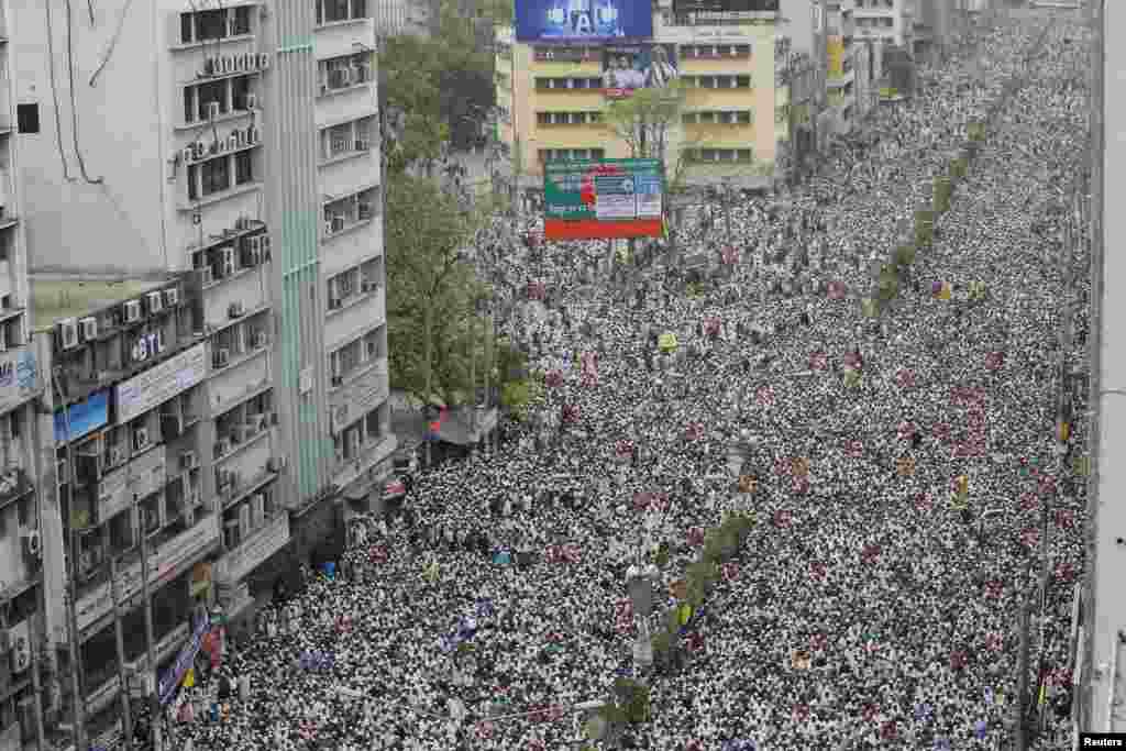 Activists of Islami Andolan Bangladesh take part in a grand rally in Dhaka to demand the introduction of a blasphemy law and the restoration of a caretaker government system to conduct the upcoming general elections, among other issues, local media reported.