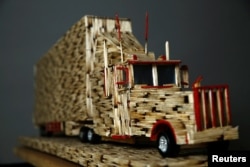 A replica of the truck made from matchsticks by Janusz Urbanski is pictured at his flat in Ruda Slaska, Poland, May 4, 2016.